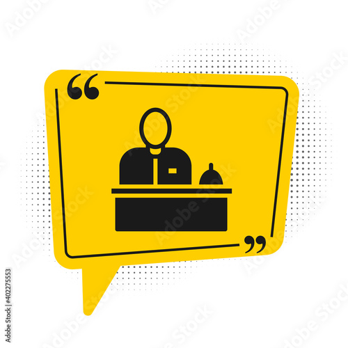 Black Receptionist standing at hotel reception desk icon isolated on white background. Yellow speech bubble symbol. Vector.