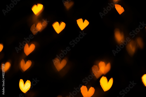Heart shaped bokeh lights night sky background