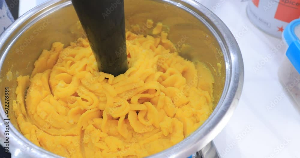 In the kitchen, mashed potatoes are cooked with a blender food