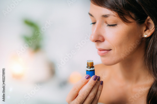 Holding and Smelling Ayurvedic Oil