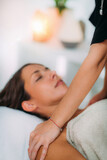 Ayurveda Massage Treatment. Massaging Shoulders with Ayurvedic Essential Oils