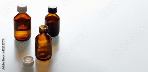 Set of small brown glass bottles