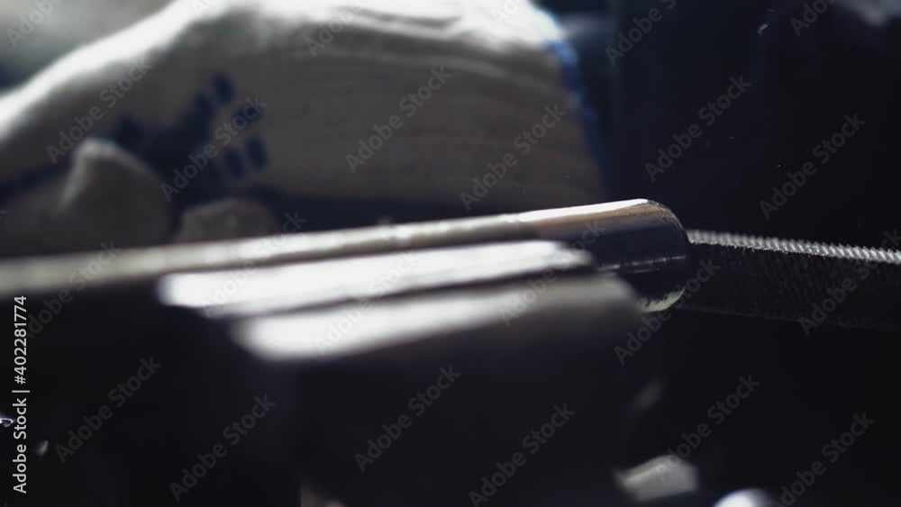 Rasp File Held in Gloved Hands is Used to Smooth the Rough Edges on a Silver Metal Pipe Being Held in a Vice. Sharpening Metal. Close Up. Unrecognizable Person. High quality 4k footage Rasp File Held in Gloved Hands is Used to Smooth the Rough Edges on a Silver Metal Pipe Being Held in a Vice. Sharpening Metal. Close Up. Unrecognizable Person. High quality 4k footage