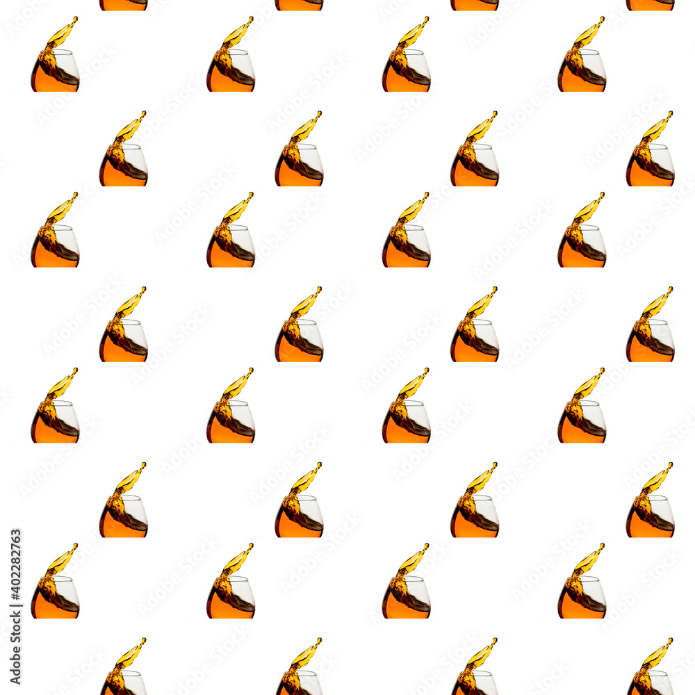 Freeze Action Photography .Splash of Cognac In glass pattern Isolated on White background