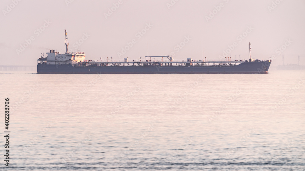 Oil tanker in foggy sea