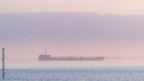 Oil tanker in foggy sea