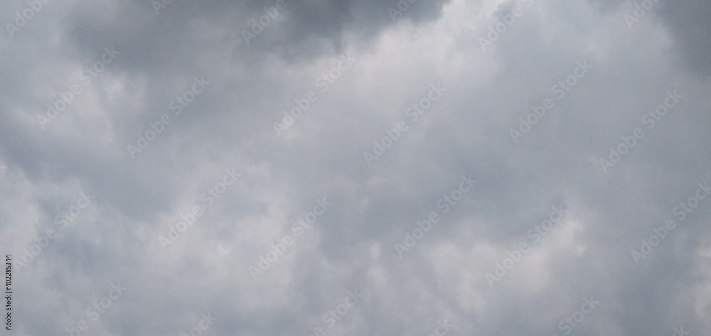 Dark stormy skies with large grey Nimbostratus cloud formations during a rain storm 