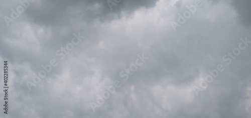 Dark stormy skies with large grey Nimbostratus cloud formations during a rain storm 