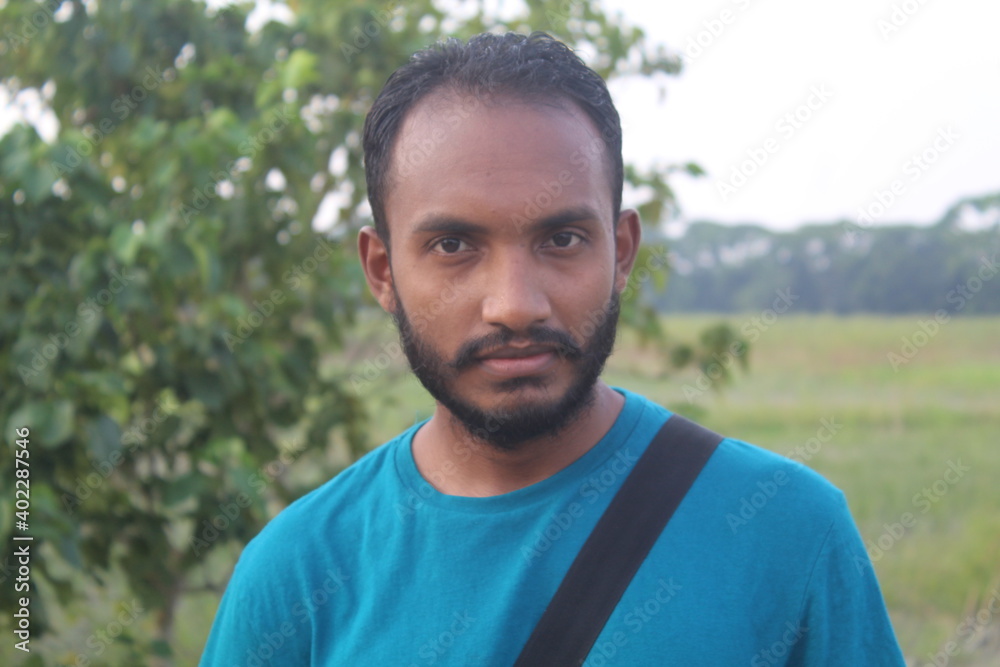 Portrait of handsome runner with beard in nature Portrait of handsome runner with beard in nature