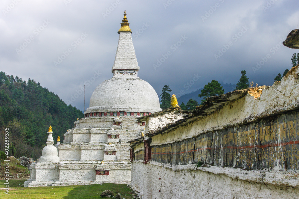 View of Buddhist monument Chendebji chorten with prayer wall near Trongsa in Central Bhutan, a stupa built in the Nepalese style