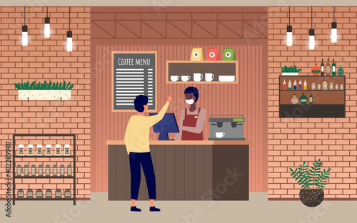 Man buy coffee at bakery shop or cafe with brick wall in interior. Male barista seller in face mask in bakery serves male customer. Visitor at the coffee shop during quarantine, safe service concept