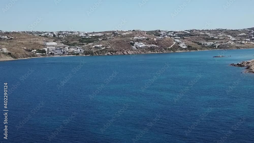 Aerial Drone Moving Backwards Beach Mykonos Blue Water Aerial Drone Moving Backwards Beach Mykonos Blue Water