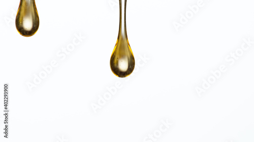 Pouring oil drop isolated o...