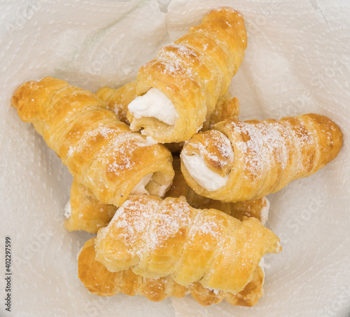 cream horn or schamroll traditional sweet europe cake  photo