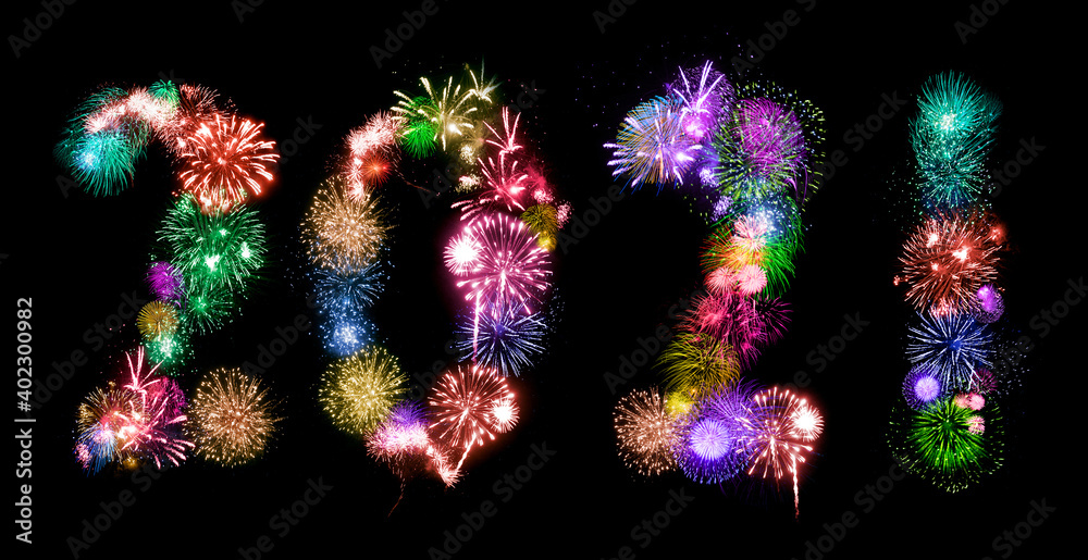 2021 New Year. Two thousand twenty one Happy New Year. Numbers are made of holiday fireworks over the on black 2021 New Year. Two thousand twenty one Happy New Year. Numbers are made of holiday fireworks over the on black