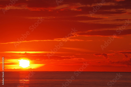 sea sunset with lighted clouds 