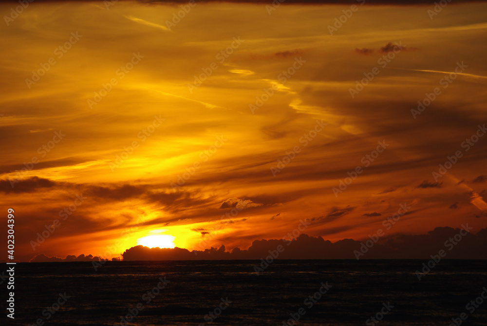 sea sunset with lighted clouds sea sunset with lighted clouds