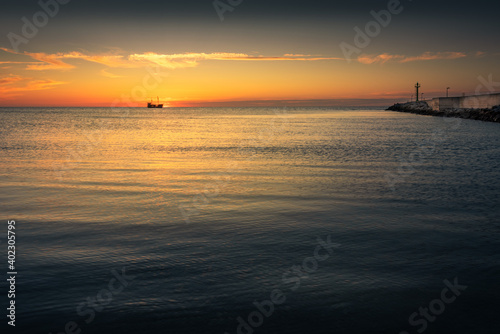 Old ship during the sunset over the Baltic Sea © aboutfoto