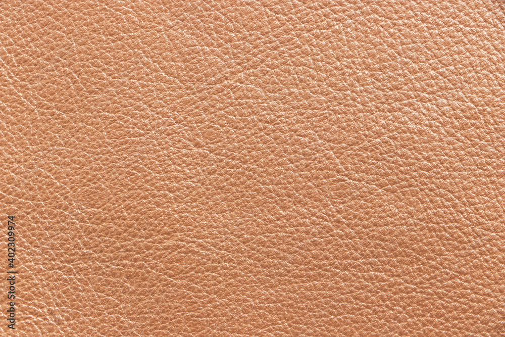 Sample texture of genuine leather beige colour. Close-up. Sample texture of genuine leather beige colour. Close-up.