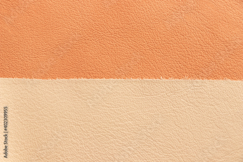 Samples and texture of natural leather in beige and milky colors. Close-up.