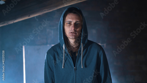 Cuadro en lienzo Portrait of drug addict man walking in abandoned place