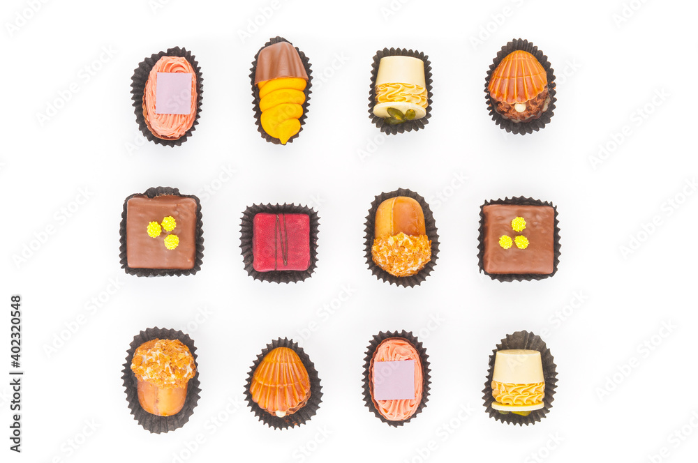 Up view on chocolate praline candies isolated on white background