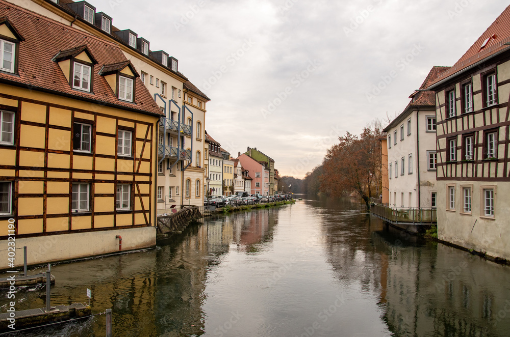 Bamberg, Germany, 20.12.2020. View from the Upper Muehl Bridge over the Regnitz towards the historic old town. High quality photo