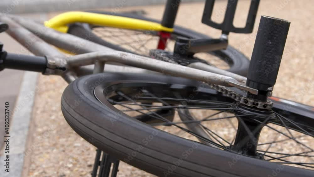 Slow motion close up of bmx bike wheel spinning Slow motion close up of bmx bike wheel spinning