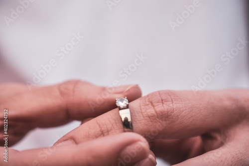 Close up hand holding wedding ring concept Couple love in Valentine