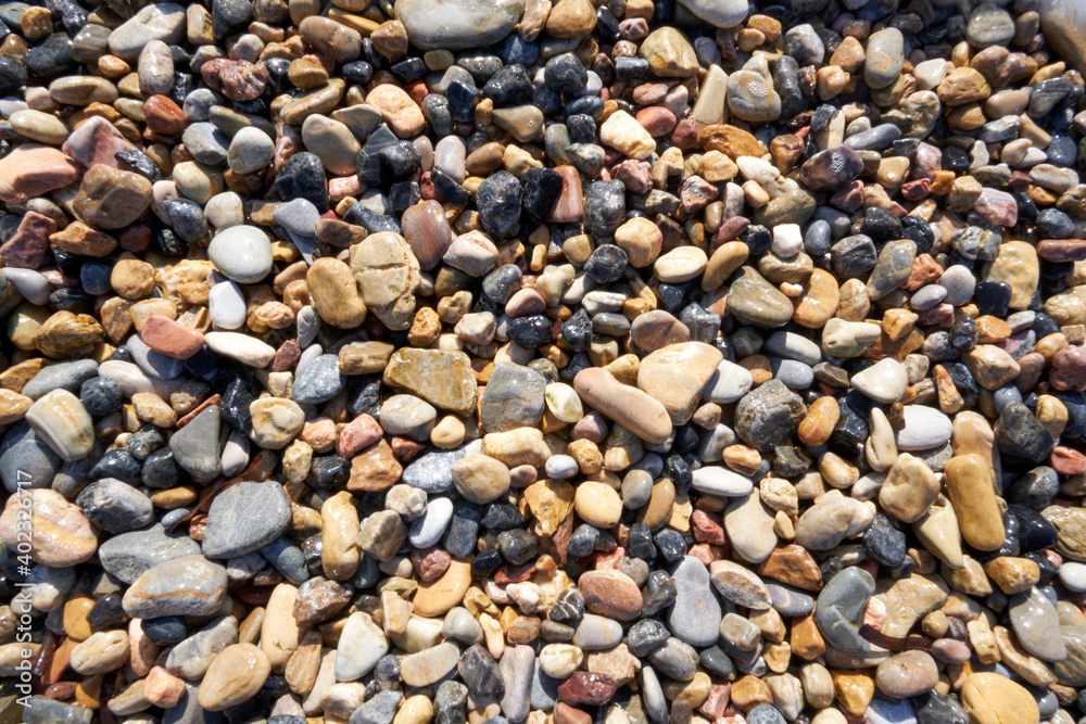 The image of stones and pebbles exposed to waves for years The image of stones and pebbles exposed to waves for years