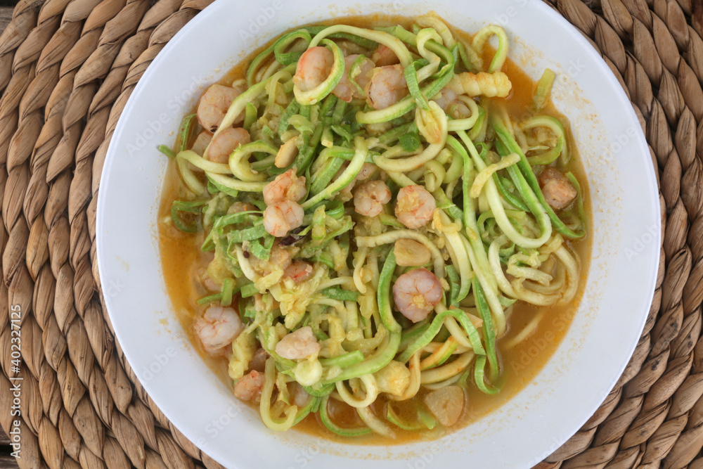 fresh and raw zucchini spaguetti with prawns as imitation of italian pasta for vegetarian food fresh and raw zucchini spaguetti with prawns as imitation of italian pasta for vegetarian food