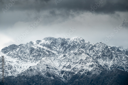 Snow capped peak of Monte Grosso in Corsica © Jon Ingall