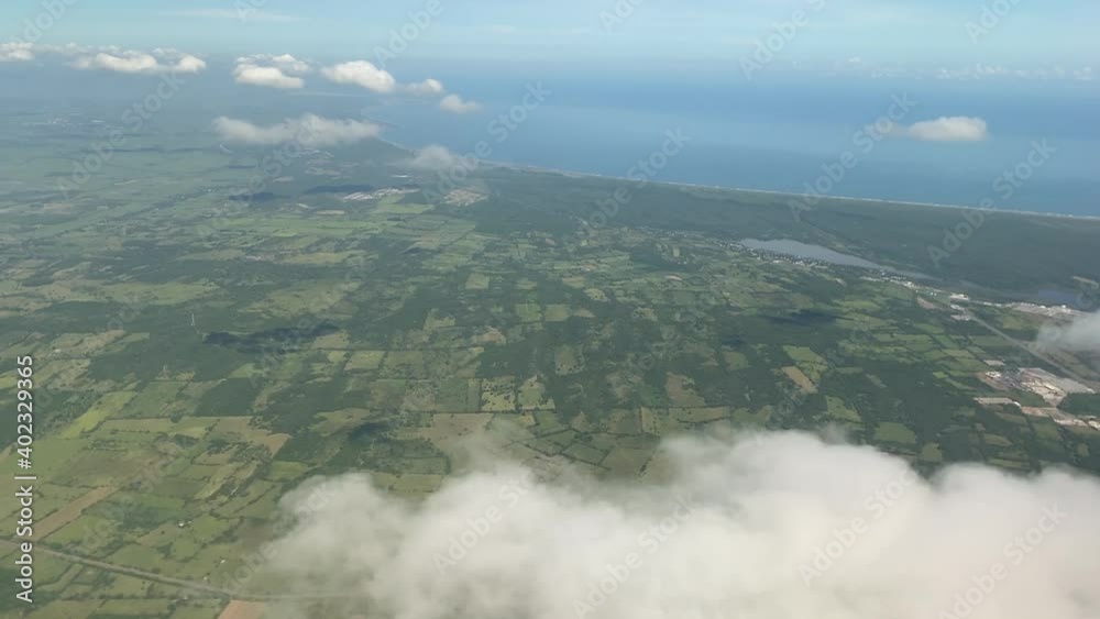 Veracruz Puerto seen from an aircraft, flying above the clouds, visit