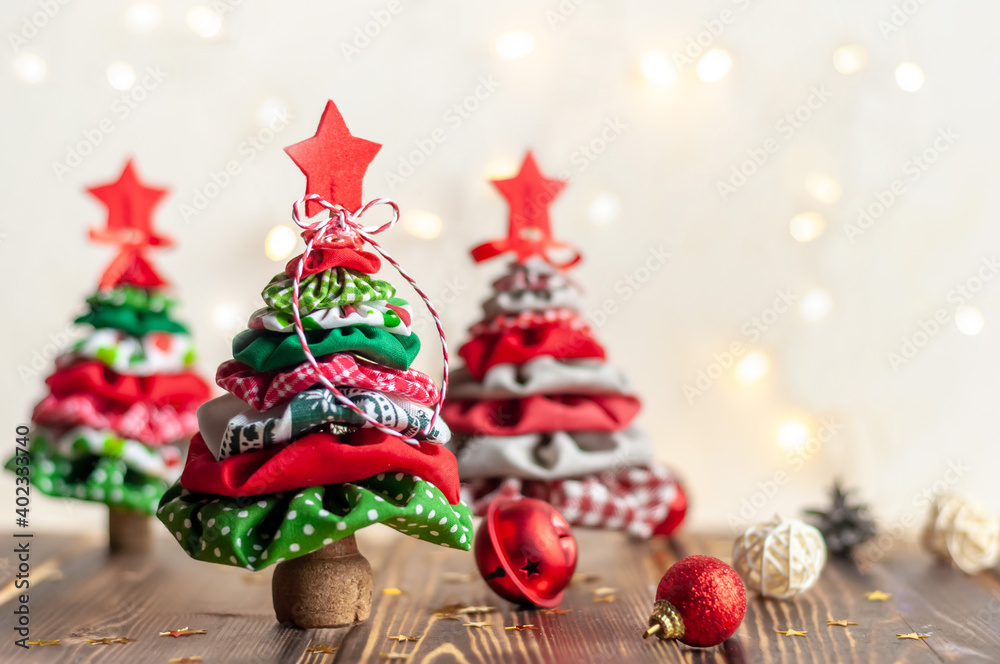 Christmas tree made of multi-colored fabric.Christmas and New Year. Christmas tree made of multi-colored fabric.Christmas and New Year.