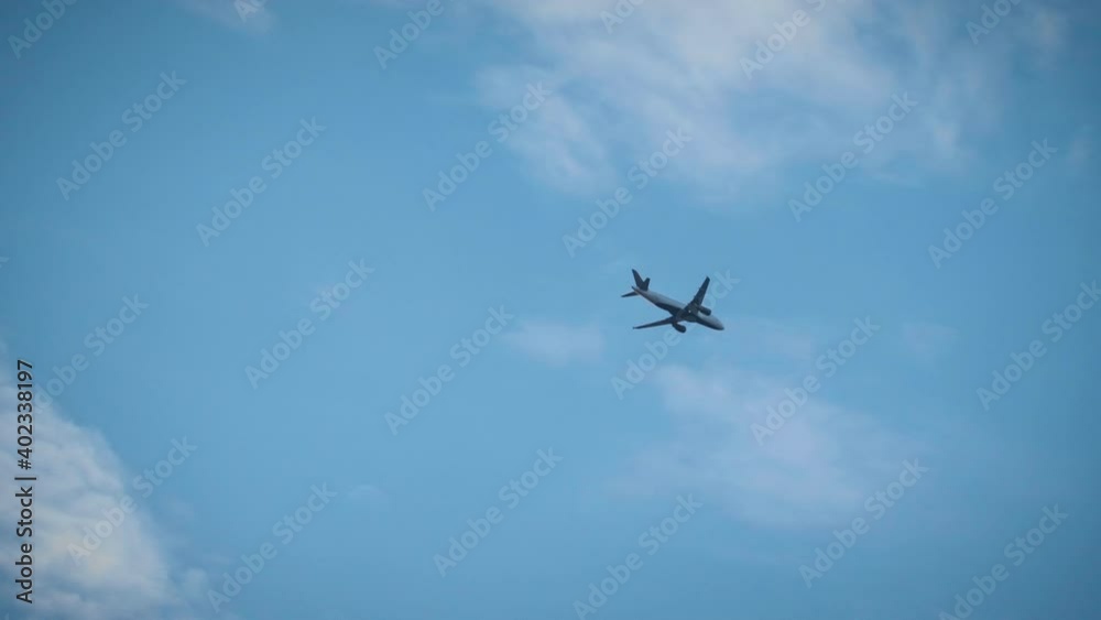 Passanger Plane Flying Blue Sky Small Clouds Daytime Tracking Passanger Plane Flying Blue Sky Small Clouds Daytime Tracking