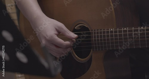 Close-up Man Playing  Guitar