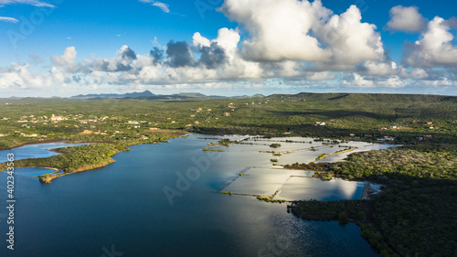 Aerial view above scenery of Curacao, Caribbean with ocean, coast, hills  © NaturePicsFilms