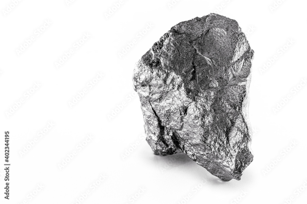 Platinum nugget on an isolated white background, is a chemical element used in the chemical industry as a catalyst for the production of nitric acid, silicone and benzene.