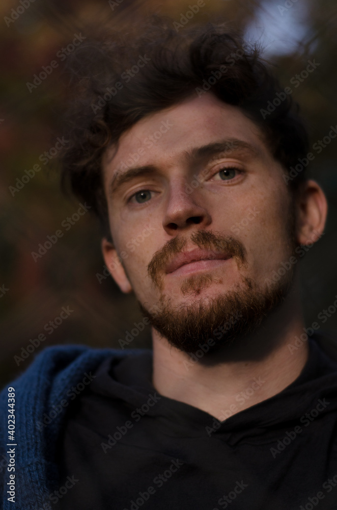 Portrait of a guy with a beard and mustache
Portrait of a guy with a beard and mustache