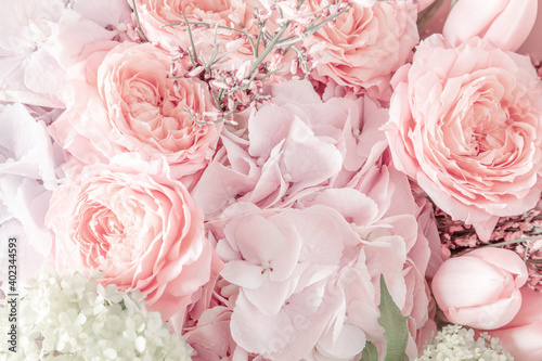 Fototapeta Naklejka Na Ścianę i Meble -  Flowers  modern composition. Beautiful wedding bouquet. Decoration bouquet made of roses, tulips and decorative plants. Flat lay, top view, copy space
