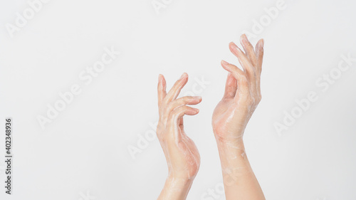 Washing hand gusture and soap foam wipe for prevention and hygiene on white background.