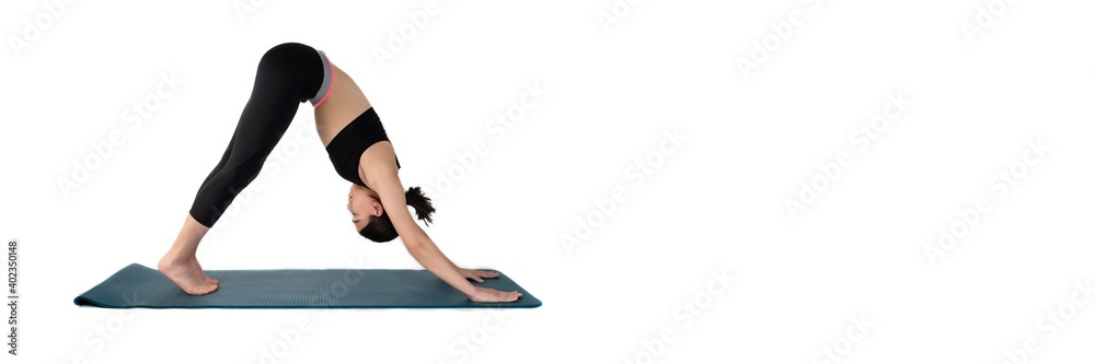 Young woman doing yoga practice isolated on white background. Flexible fit female body. Banner panoramic. Copy space for text message. High resolution sharp photo. Young woman doing yoga practice isolated on white background. Flexible fit female body. Banner panoramic. Copy space for text message. High resolution sharp photo.