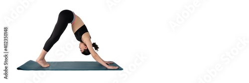 Young woman doing yoga practice isolated on white background. Flexible fit female body. Banner panoramic. Copy space for text message. High resolution sharp photo.