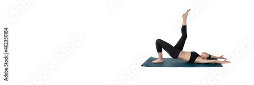 Young woman doing yoga practice isolated on white background. Flexible fit female body. Banner panoramic. Copy space for text message. High resolution sharp photo.