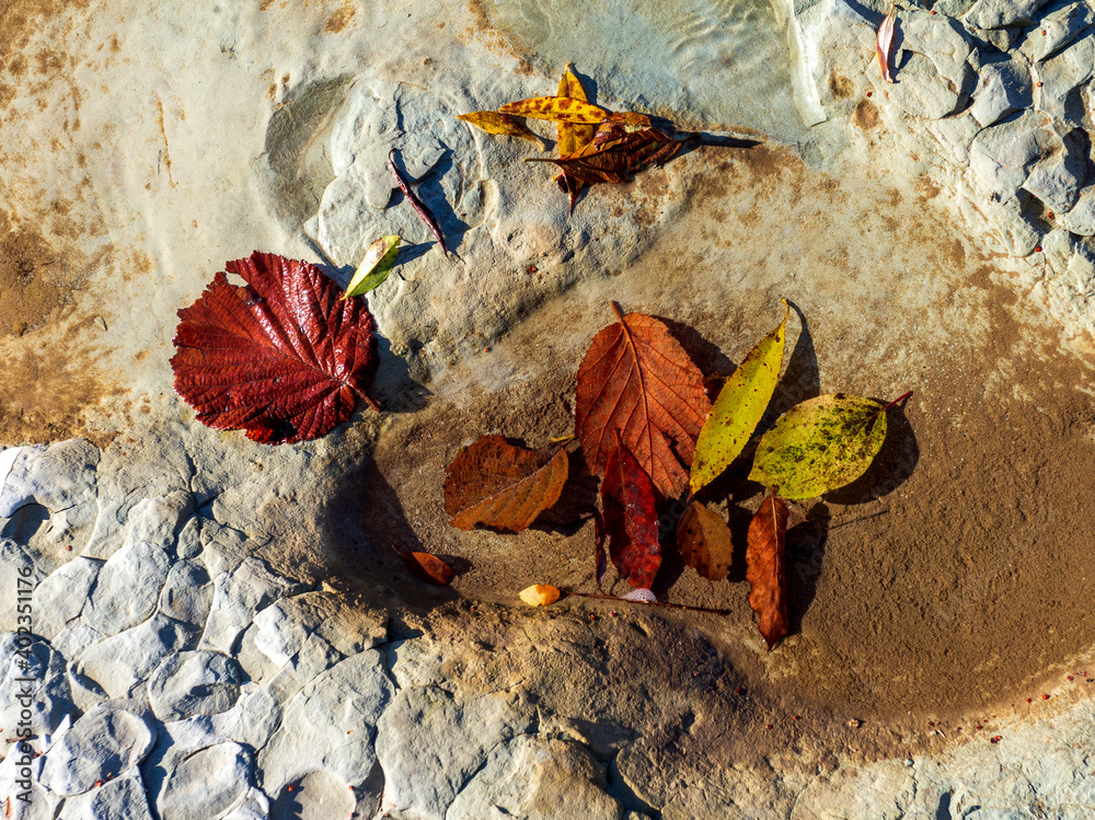 Natural river stony bottom, shallow riverbed during autumn weather on a Sunny day in a mountainous area. Natural river stony bottom, shallow riverbed during autumn weather on a Sunny day in a mountainous area.