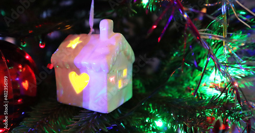Christmas tree with new year decorations. New Year celebration. Selective soft focus. Background for postcards. Banner.