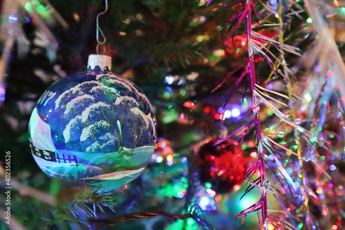 Christmas tree with new year decorations. New Year celebration. Selective soft focus. Background for postcards