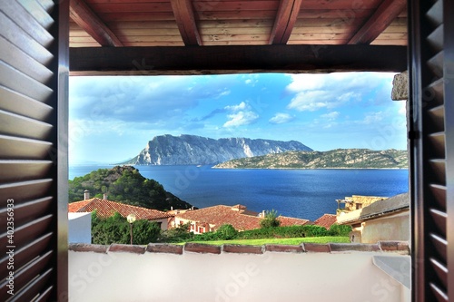 Sea view through traditional Mediterranean window