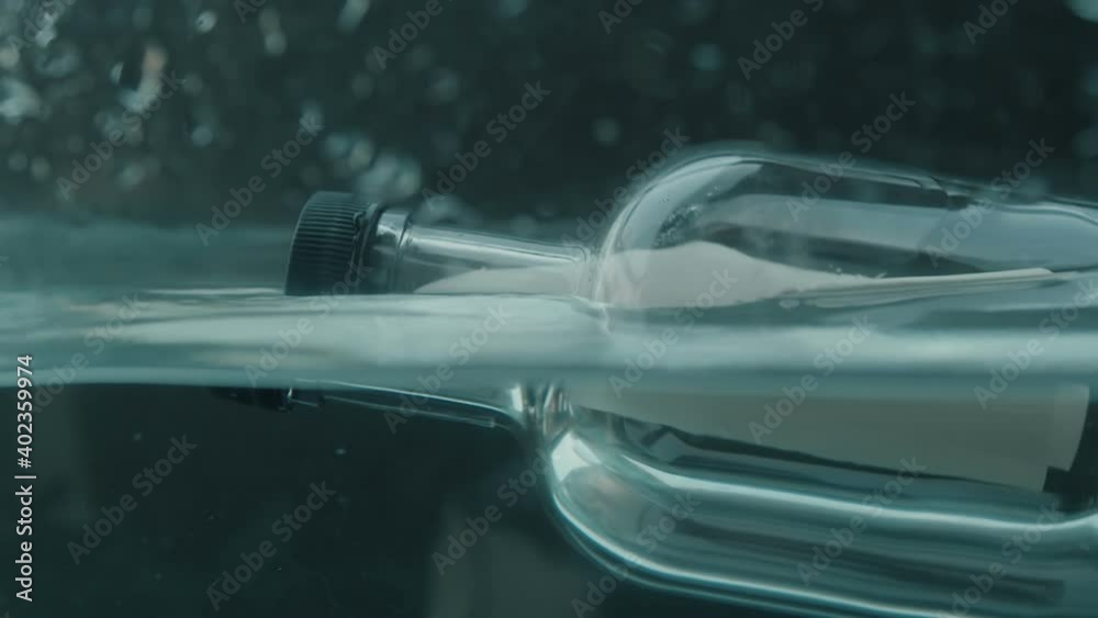 message in a bottle in water