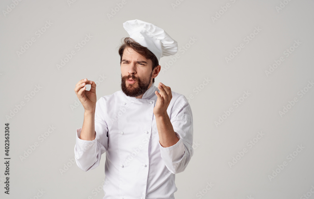 chef man in light clothes gesturing with his hands headdress Copy Space cropped view chef man in light clothes gesturing with his hands headdress Copy Space cropped view